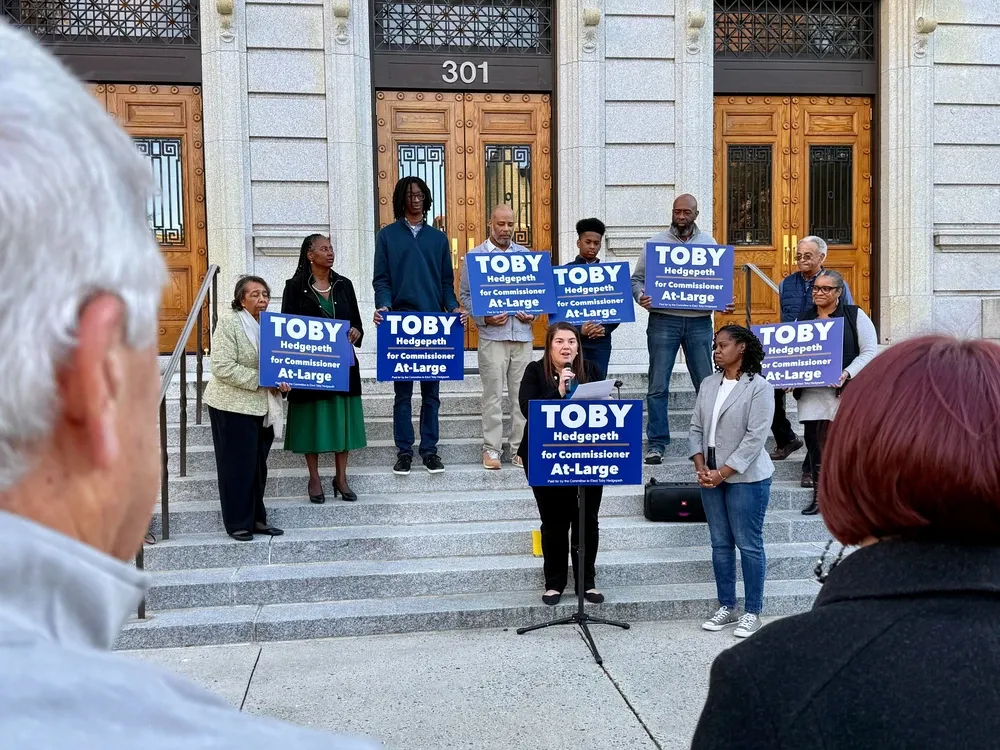 Commissioner Mary Beth Murphy speaking at a rally for Toby Hedgepeth